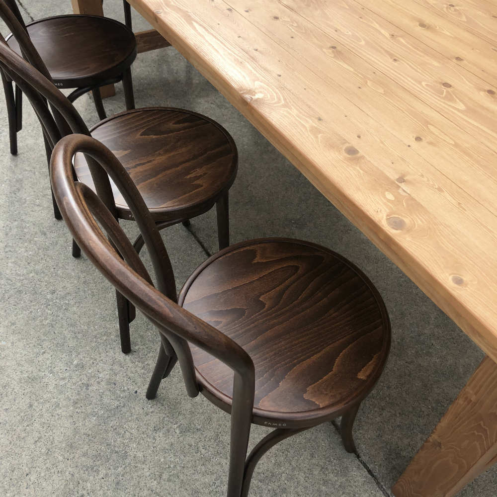 Wooden Dining Table with chairs close up - Wanaka Wedding Hire - Wanaka Wedding and Events